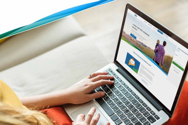 Woman viewing newly designed Cabot Financial website