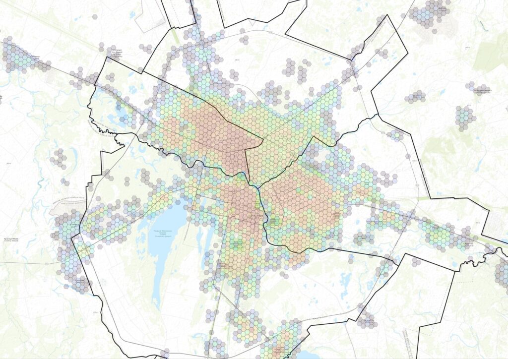 H3 Geospatial Tiling System - Astana, Kazakhstan, showing five original areas for which demographic data was provided, and the resulting H3 hexagon layer, with weighted demographic data (low to high values shown)